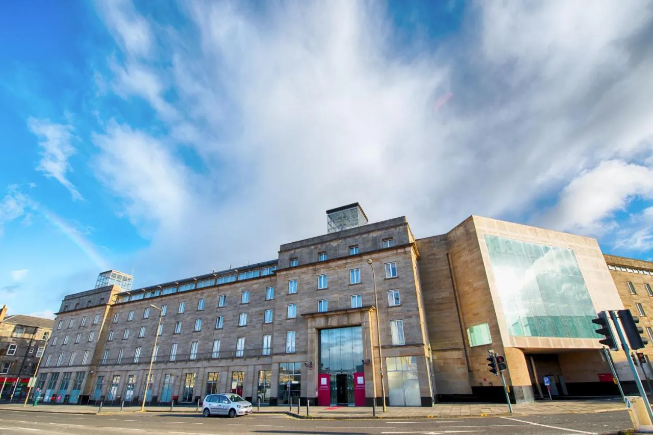a building on the corner of a street at Leonardo Hotel Edinburgh Haymarket in Edinburgh